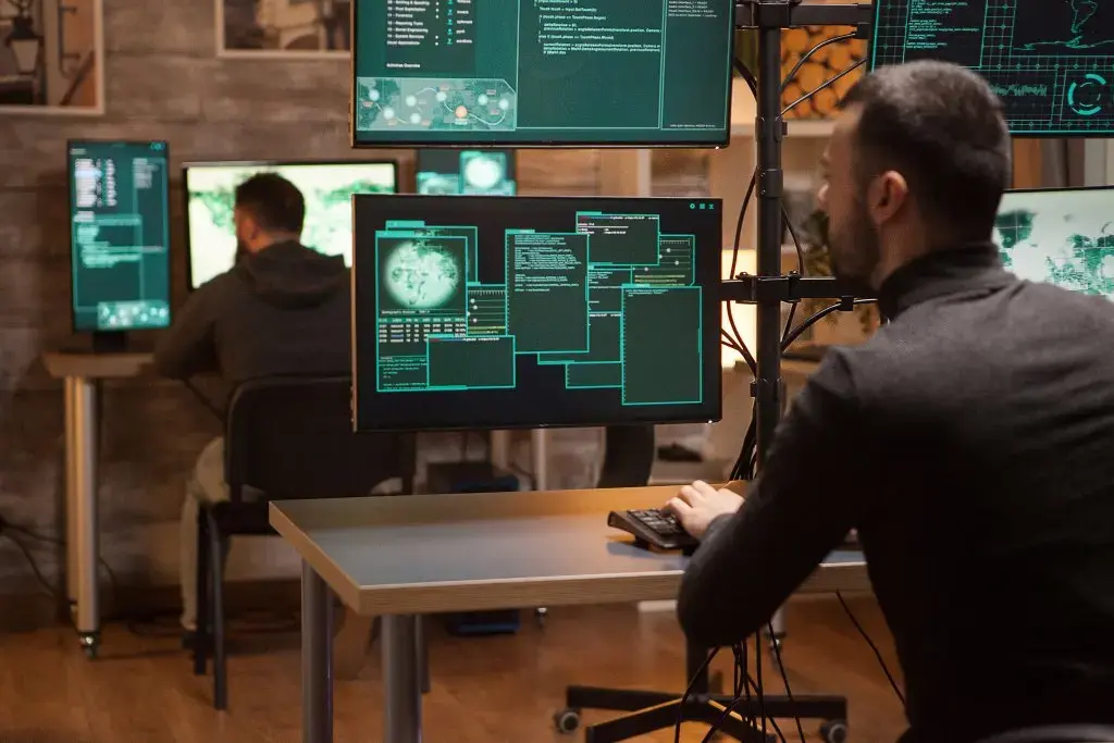 back-view-dangerous-team-hackers-working-new-malware.jpg back-view-dangerous-team-hackers-working-new-malware.jpg